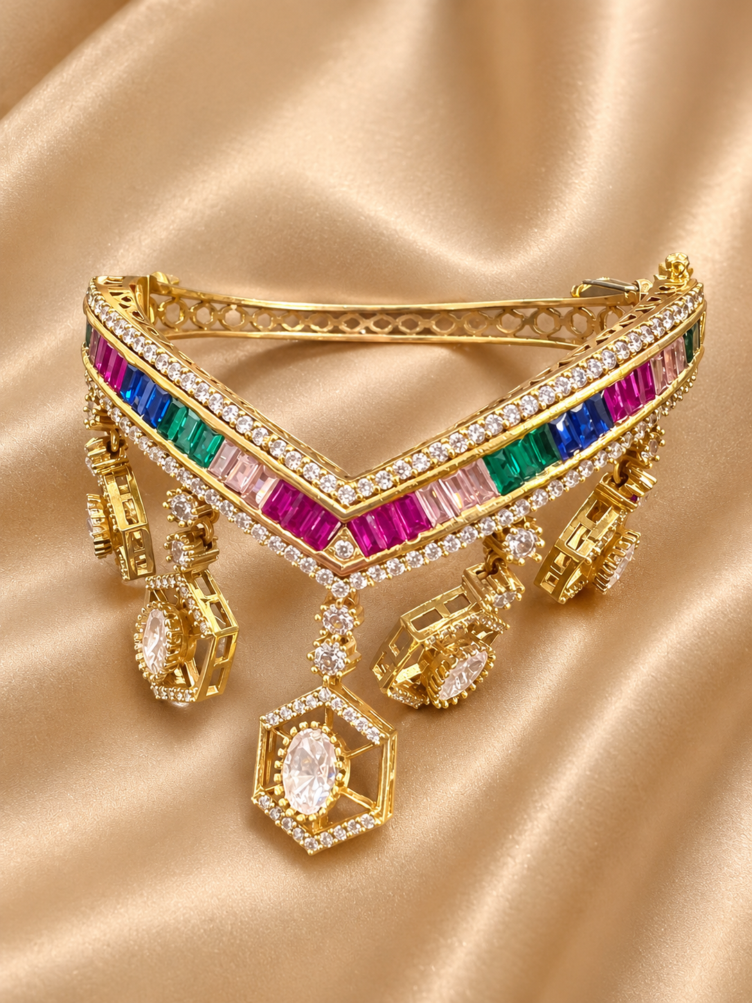 Gold bangle with multicolour gemstones and crystal charms